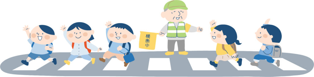 子供たちが横断歩道を横断している風景